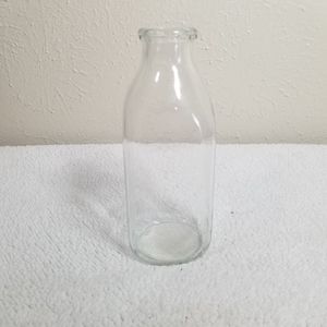 Antique quart glass milk bottle. No cracks or chips.